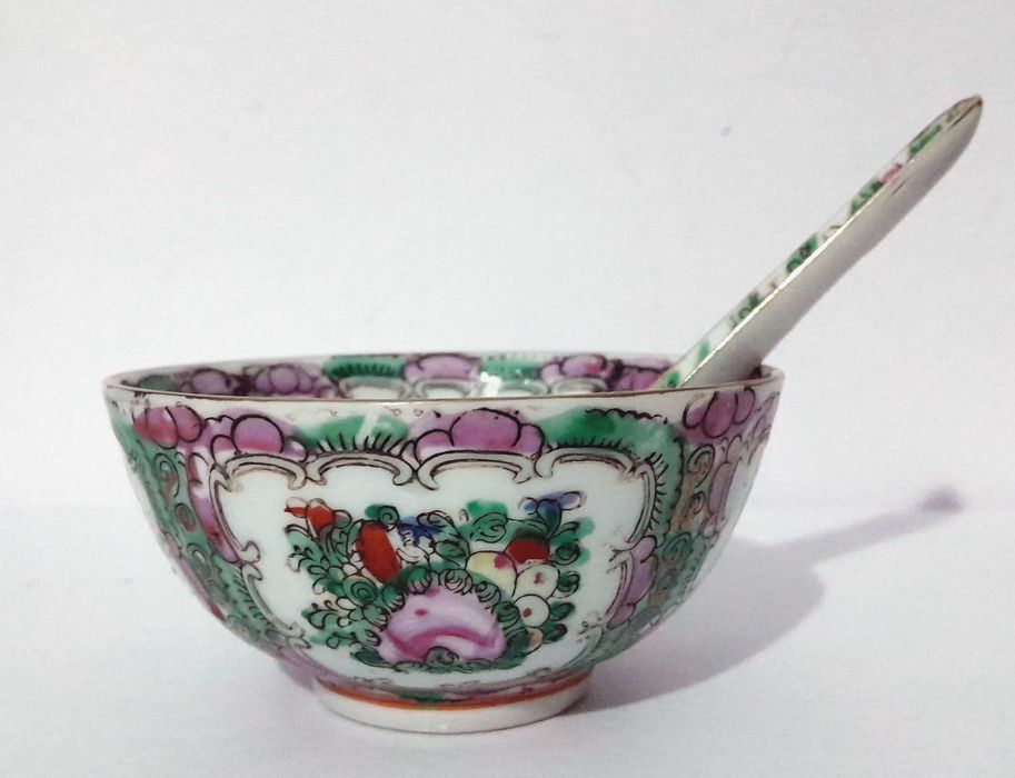 Antique porcelain cup with Macau spoon