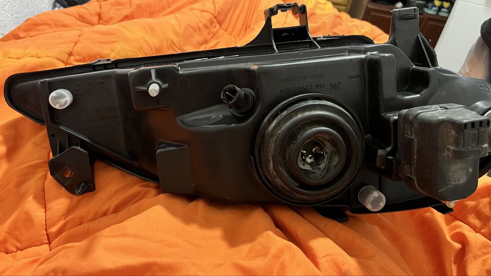 Farol reno megane 1999