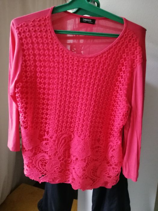 Розовий топ от бренда Erbossi.
