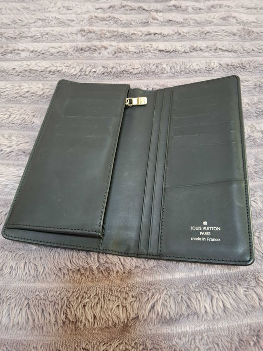 Мужской кошелек Louis Vuitton . Кожа ,состояние идеальное .