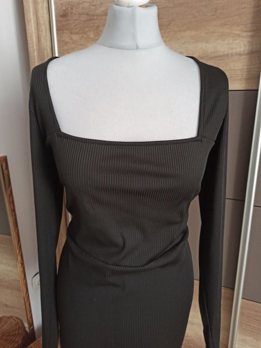 Czarny prążkowany kombinezon r. 42