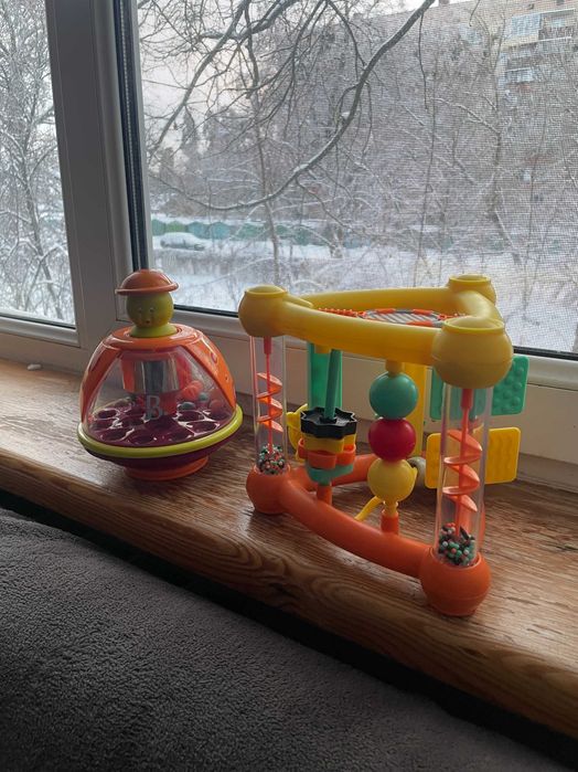 Розвиваюча іграшка Infantino Трикутник та Дзиґа Мандаринка Battat
