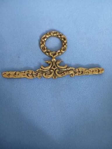 Stare mosiezne zakonczenie do lampy zegara