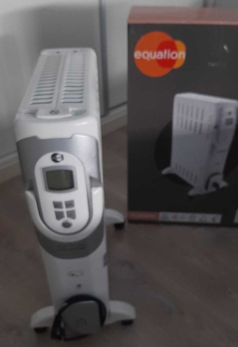 Aquecedor a óleo semi-novo.