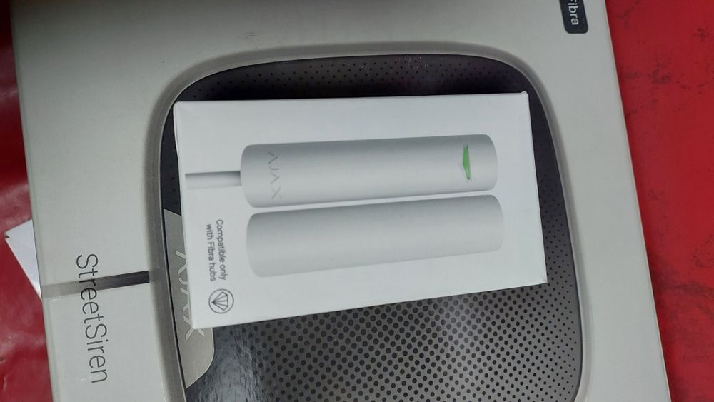 Новий магнітоконтактний сповіщувач Ajax DoorProtect Fibra white