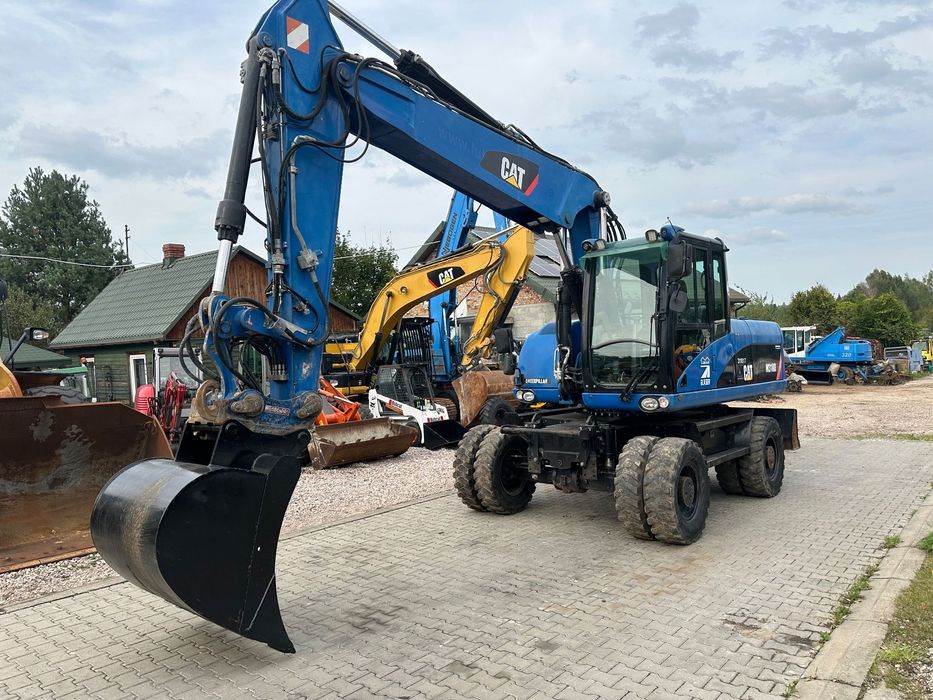 Caterpillar M 318 D  Sprowadzona z NIEMIEC/Stan bardo dobry!!