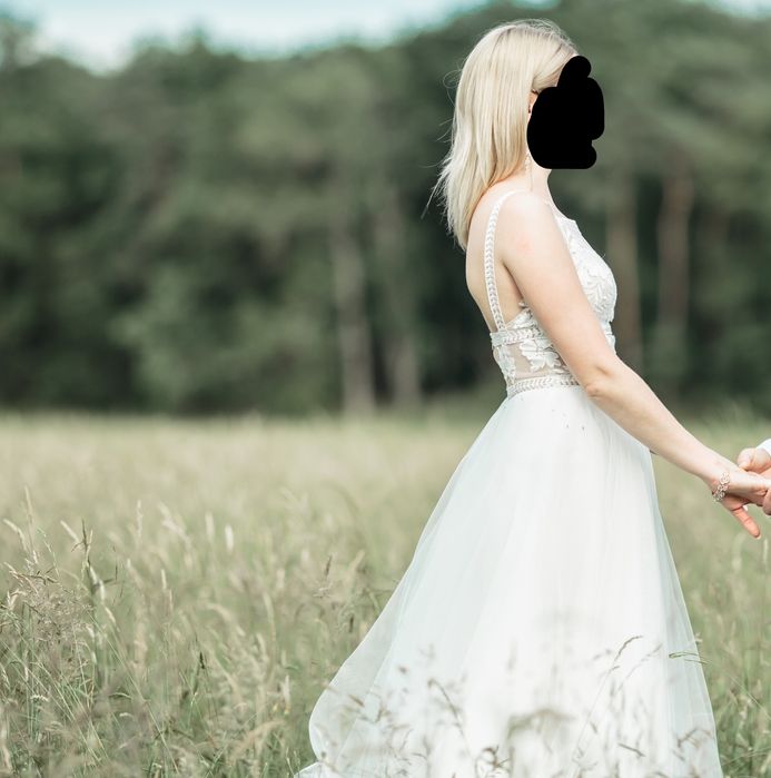 Sukienka ślubna z peleryną