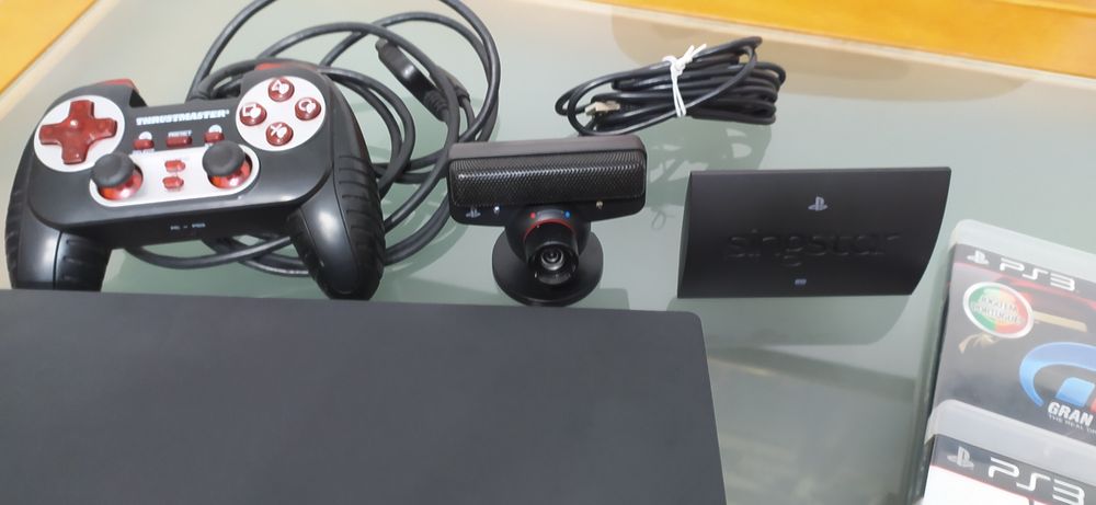 PS3 300GB + Games + Controllers + Mic + Motion Controller64729960776449124