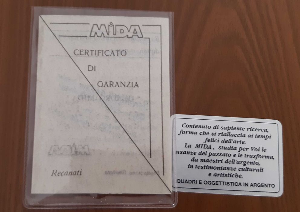 Quadro “La Mida” moldura em madeira com cercadura em dourado, centro com relevo em Prata. Certificado de Garantia