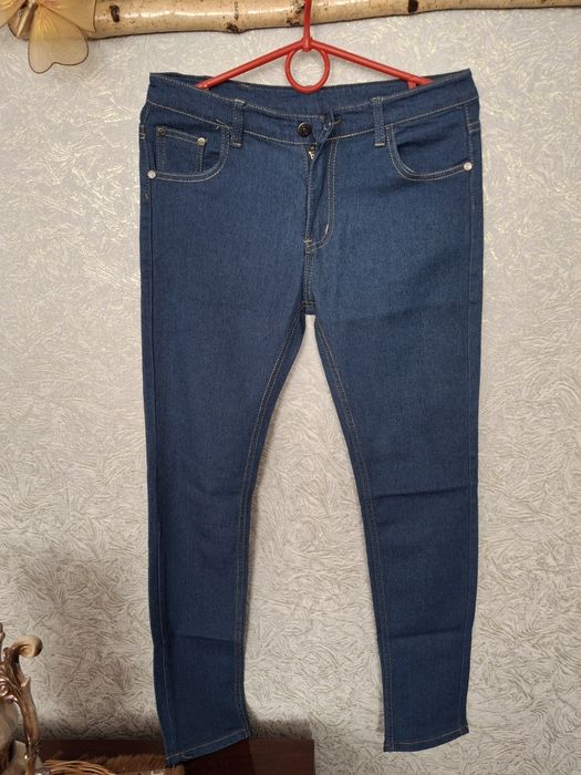 Джинси дівчачі синього кольору