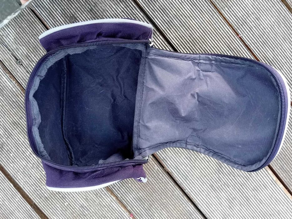 Kosmetyczka na zamek śliwkowa w kropki