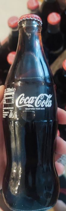 28 butelek coca cola dla kolekcjonera ze skrzynka