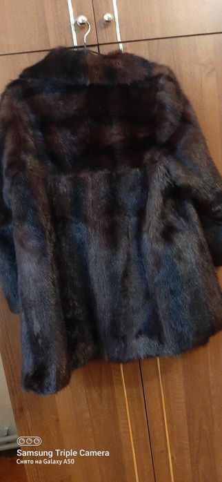 Норкова в ідеальному стані шуба.