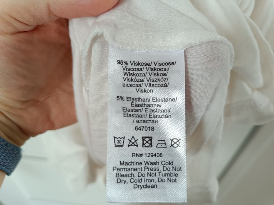 Kremowa bluzka z wycięciem na dekolcie r.48/50 nowa