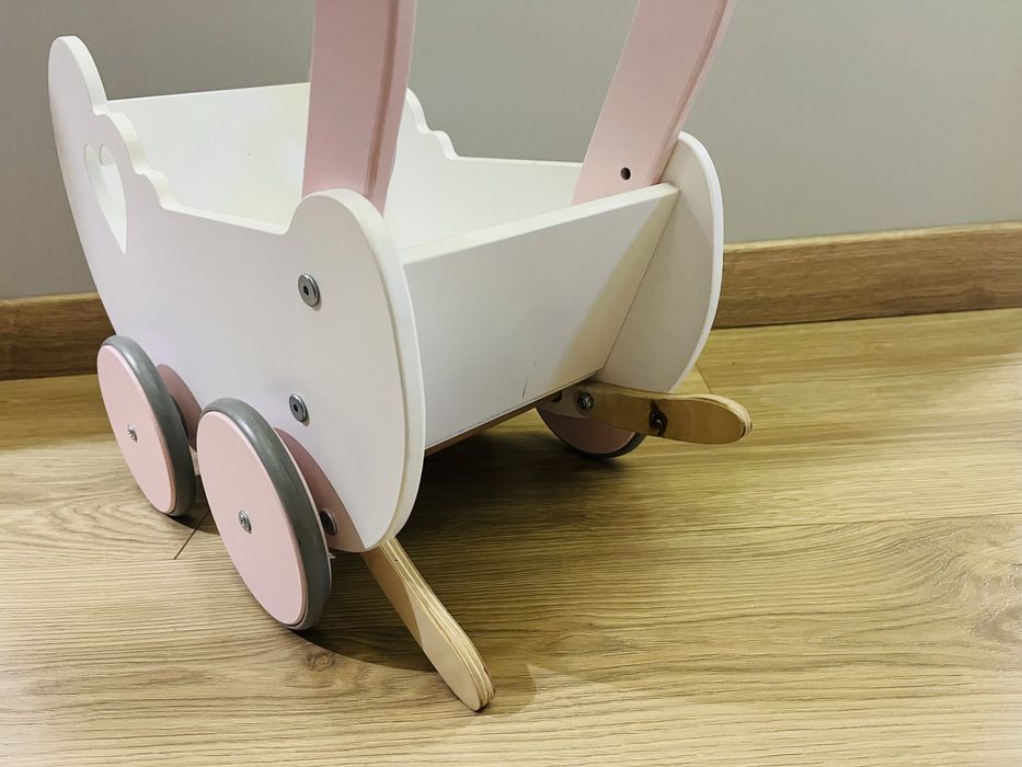 Drewniany wózek dla lalki dziecięcy pchacz jeździk na roczek chodzik
