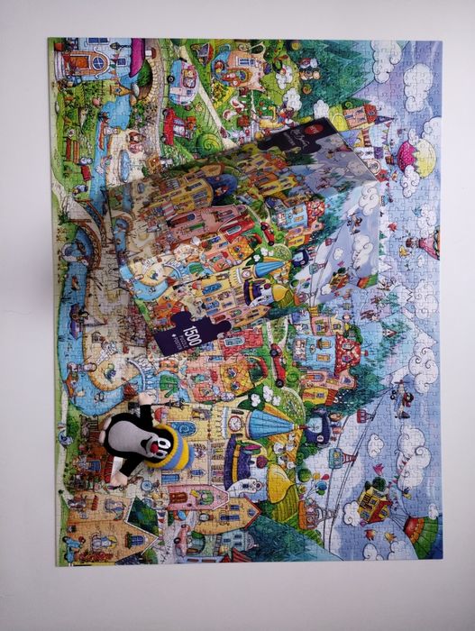 Puzzle. Heye. 1500. Happy Town. Rita Berman. Kompletne.