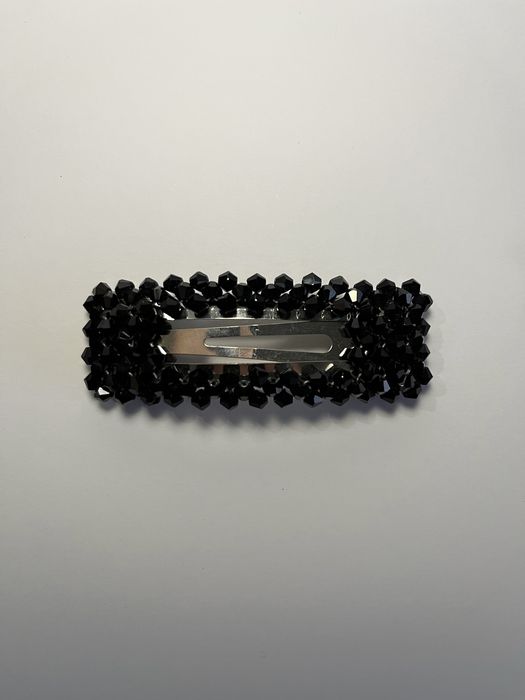 Ganchos medios de resina e miçangas