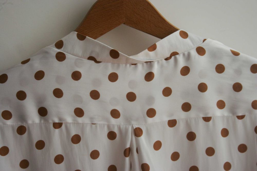 Blusa com bolas Sfera
