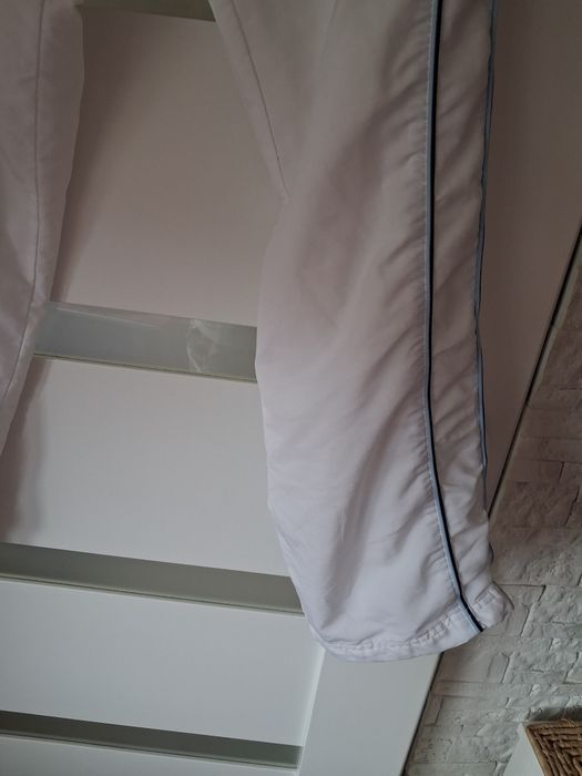 Białe spodnie Nike unisex