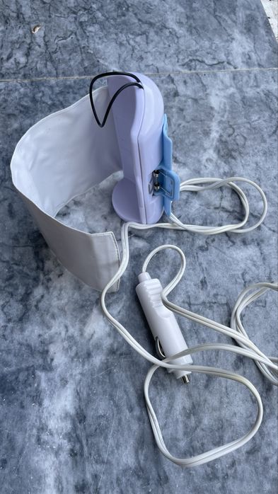 Aquecedor de biberão, funciona com isqueiro do carro muito util