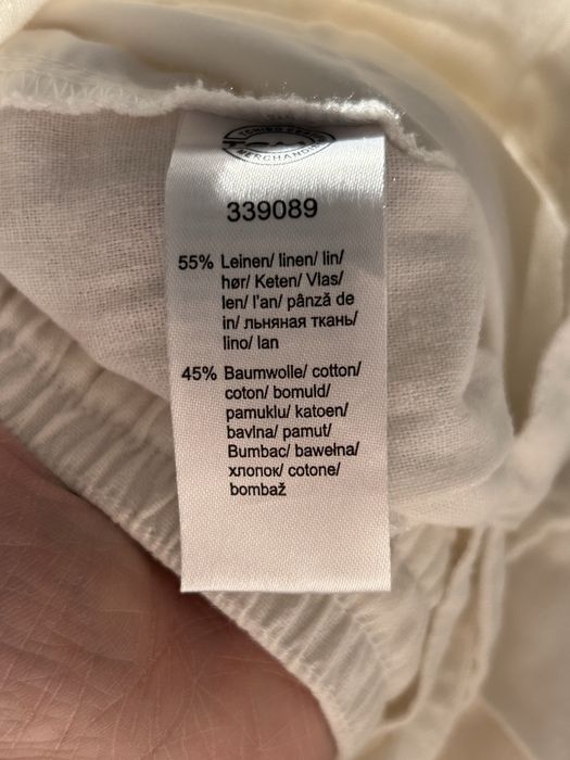 Białe spodnie lnianie Tchibo