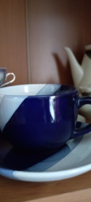 Нова парцелянова чашка з блюдцем