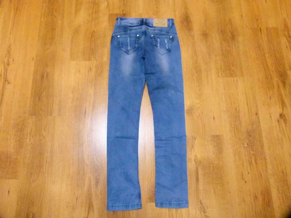 rozm 164 Yuke spodnie jeans rurki z przetarciami