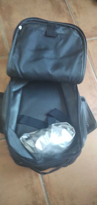 Mochila com imans para depósito de mota