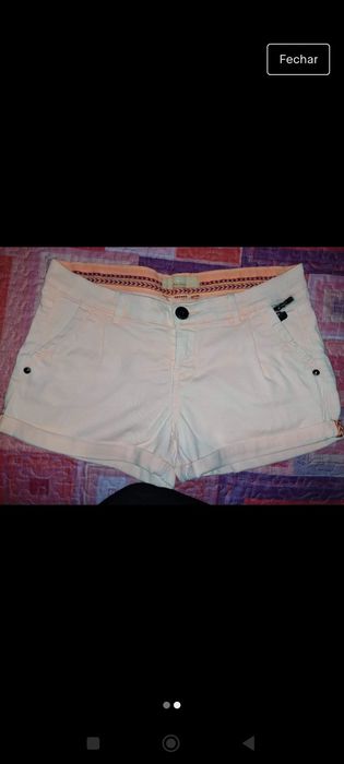 Calções de adulto e vestido de criança