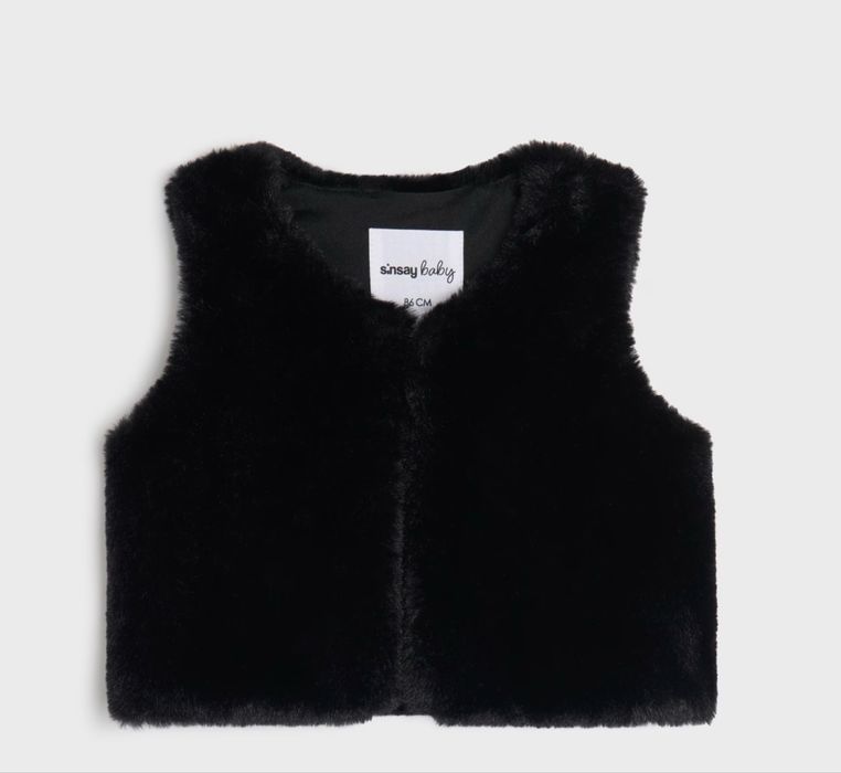 Жилет на дівчинку теплий новий