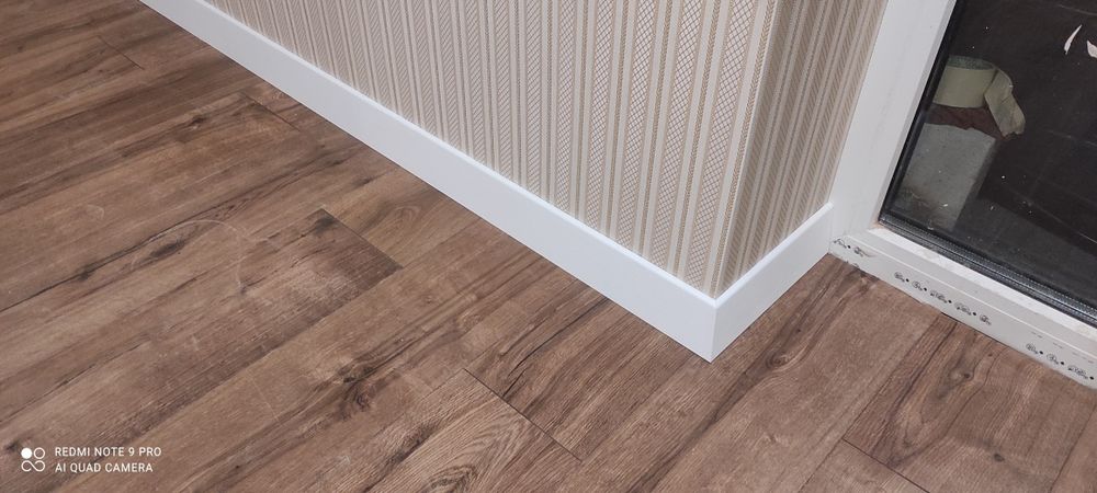 Укладка ламінату Монтаж плінтуса Укладання ламінату Плінтус Мдф
