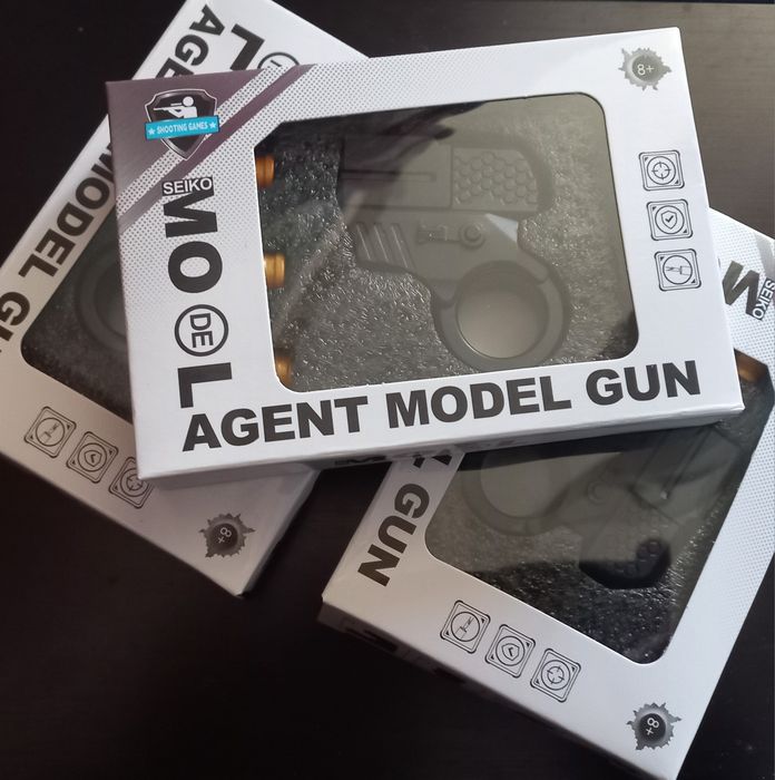 Игрушка-антистресс спиннер-пистолет в коробке+патроны (3 версии)