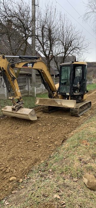 Вантажні перевезення,екскаватор,пісок,щебінь,трал,робота