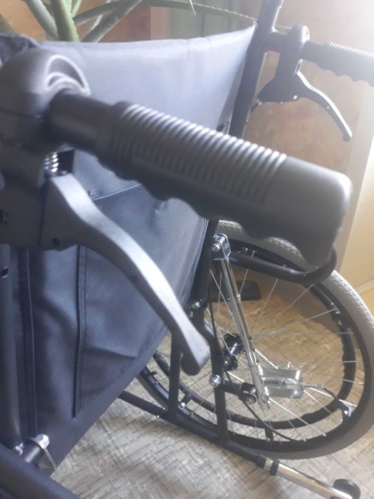Новая инвалидная коляска.