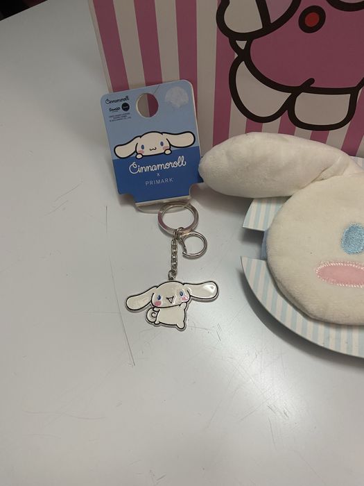 Um saco um tapa plho e um pota chave da hello kitty