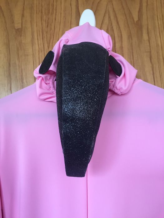 Fato de Flamingo cor-de-rosa.