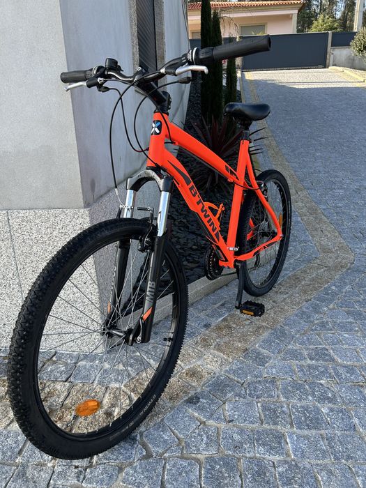 Bicileta btwin laranja como nova