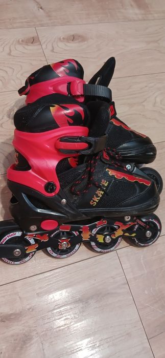 Дитячі яскраві майже нові ролики рр 35 38,