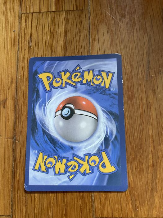 Carta Pokémon Reshiram & Charizard GX Rainbow Rare 217/214 – Unbroken Bonds