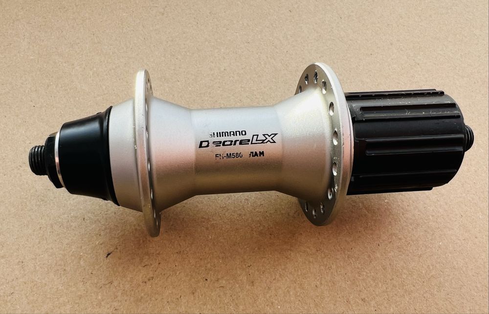 Piasta Tylna SHIMANO DEORE LX FH-M580 32 Szprychy Kaseta 8/9/10s 9x135