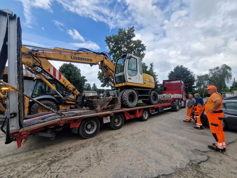 Przewóz maszyn transport traktora koparki laweta niskopodwozie