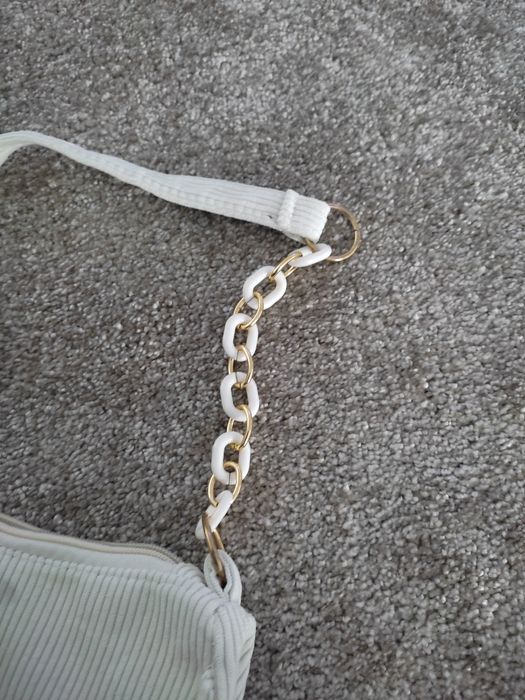 Pochete mala pequena branca e dourada