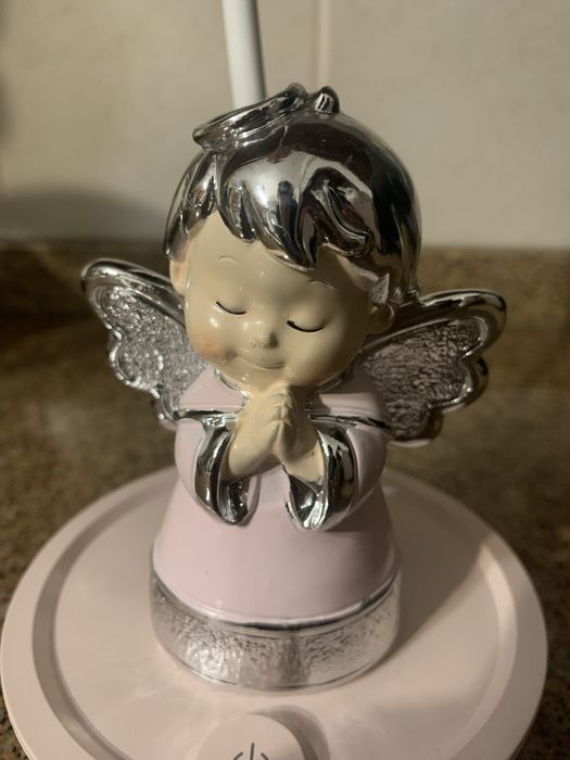 Candeeiro maleável com anjo