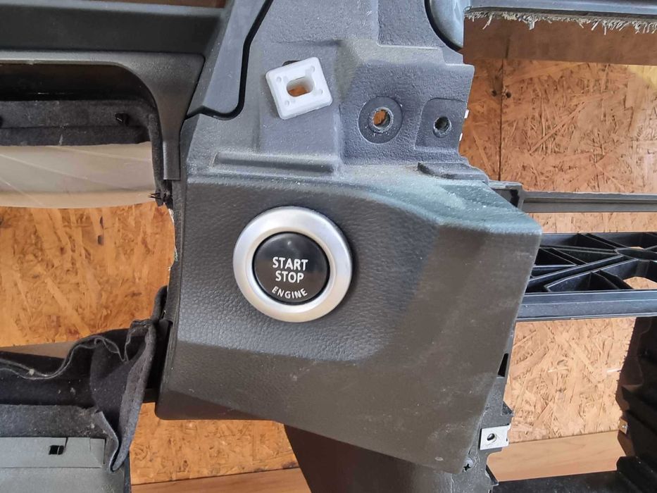 BMW e60 e61 deska rozdzielcza konsola oryginał plus uchwyty na kubki