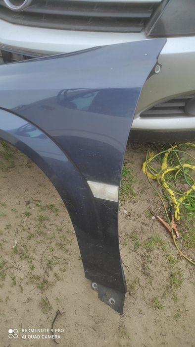 Opel Vectra C polift błotnik lewy