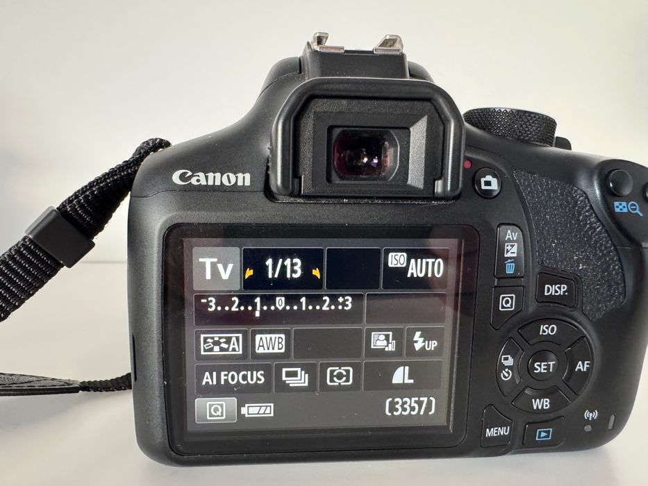 Canon 1300D lente 18-135 mm