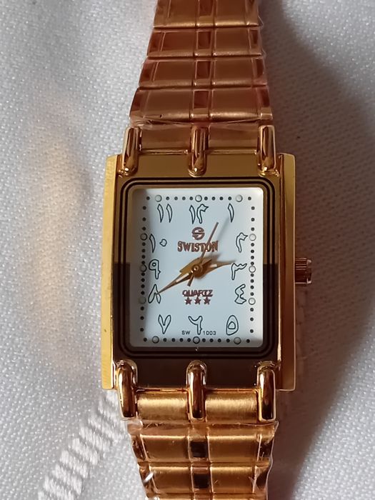 Japoński pozłacany zegarek damski swiston.