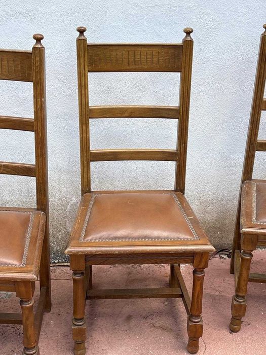 5 cadeiras almofadadas