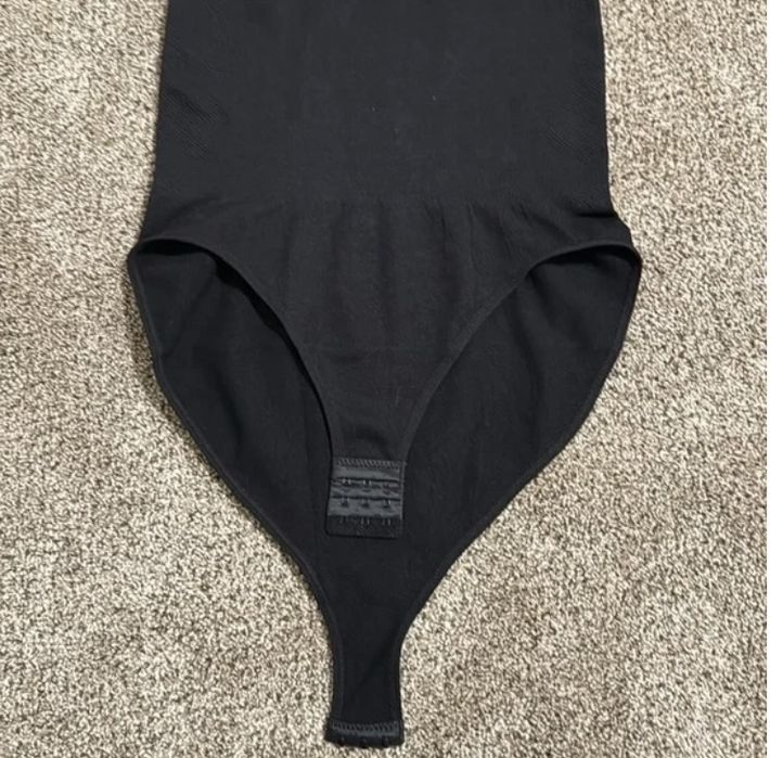 боді з ефектом утяжки