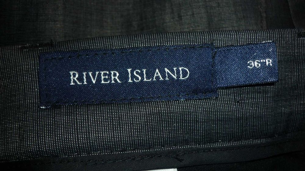 River Island- męskie eleganckie spodnie z lnem  r; 36